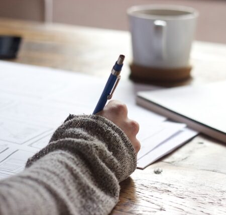 IELTS Energy 1481 - Strategies for Your Writing Task 2 Thesis Hand writing in paper