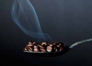 IE 1591 - Rich or Bland? Band 9 Adjectives to Describe Food on IELTS Speaking Coffee benas on a spoon